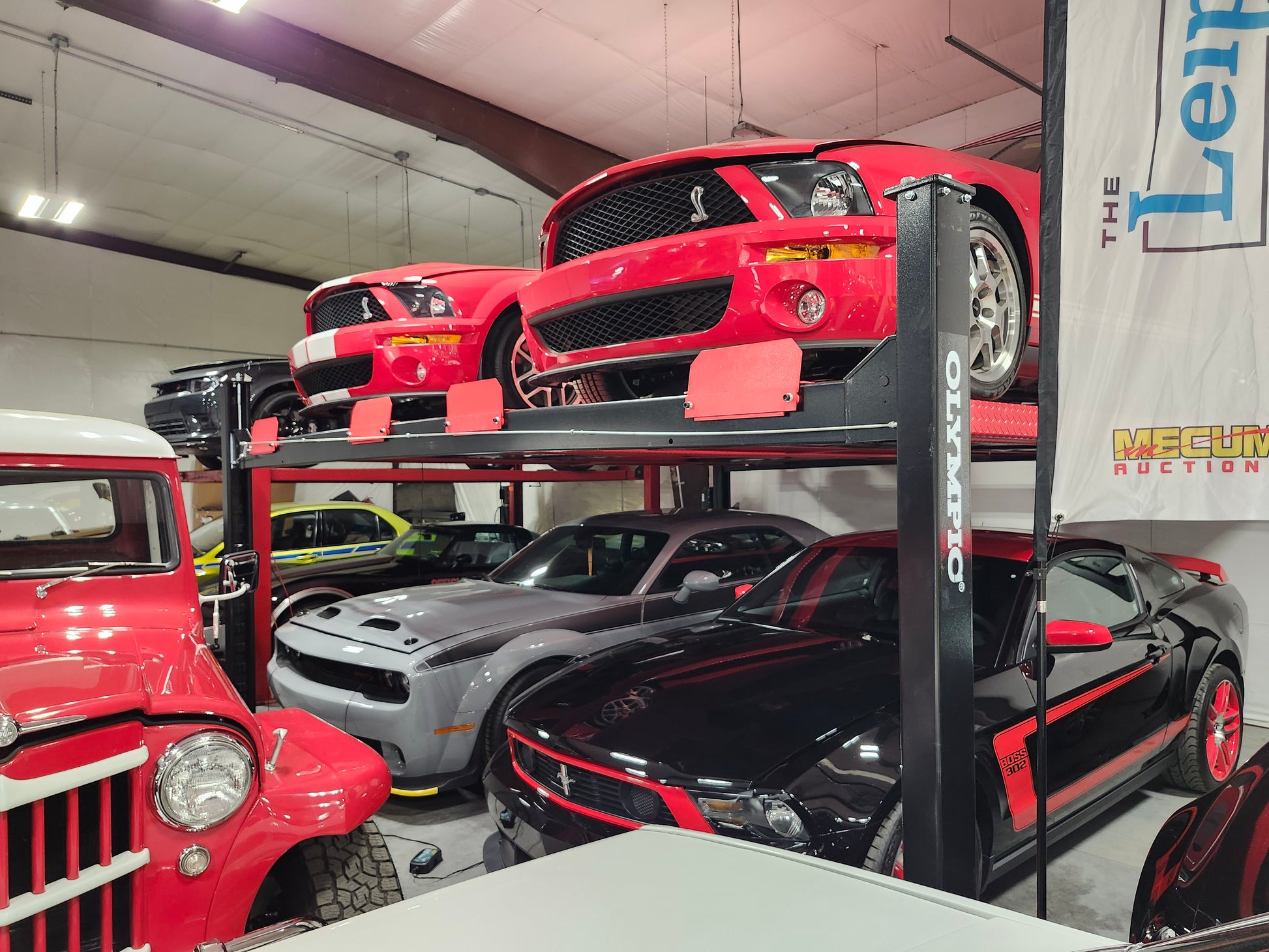 Model: Olympic 4PXW-10 / 10,000-lb. Capacity Two Car Stacker Lift / Four Car Storage Capacity / 78″ Clearance / Drip Trays / 208″ W X 224″ L / 10-Year Warranty / SHIPS FREE!