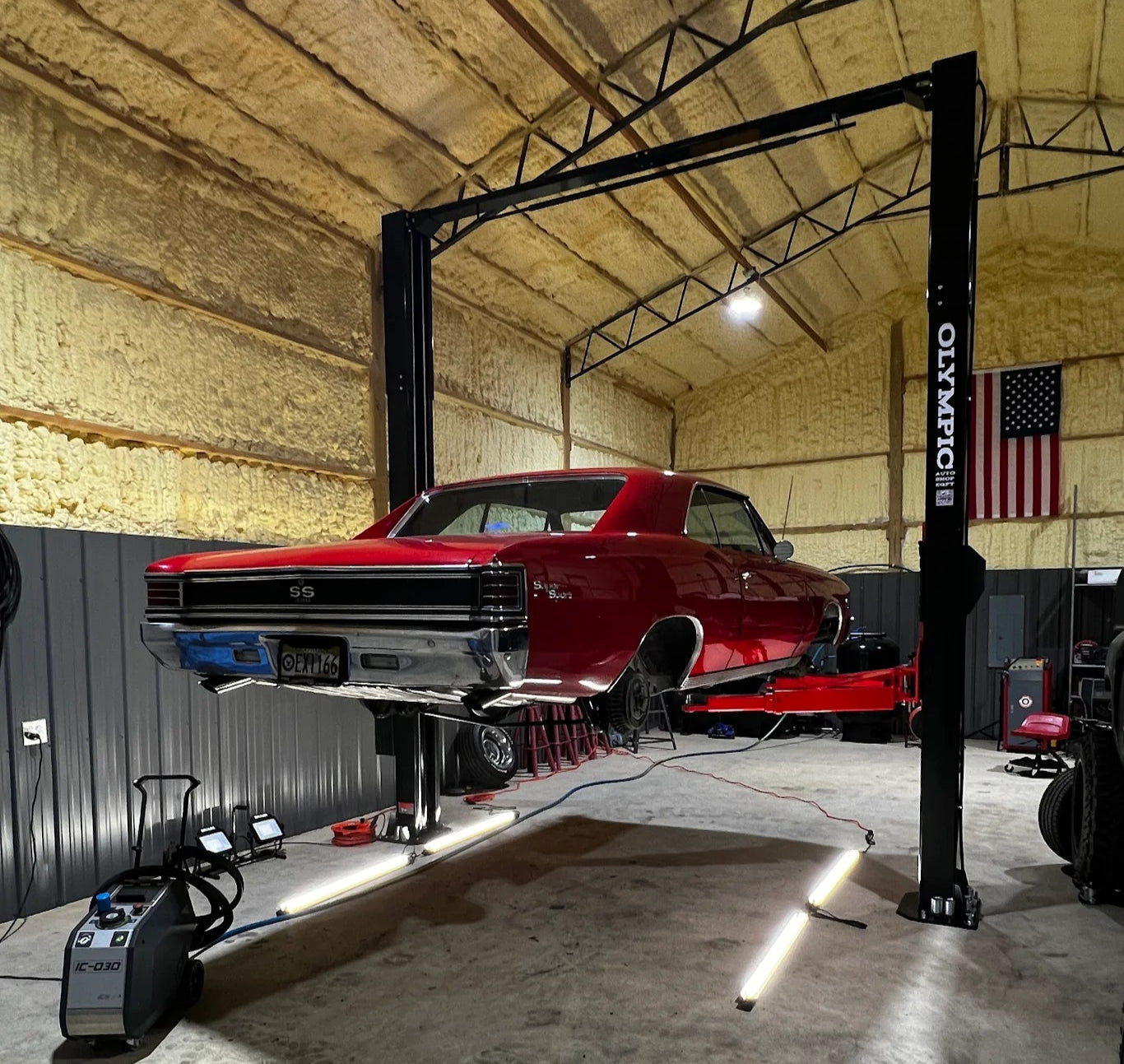 Model: Olympic 2PCFHD-12 / 12,000‐lb. HDXL / Symmetric Post / Clear floor / Single Point Lock Release / 3-Stage Arms / 3-Stage Foot Pads / 174″ H X 156″ W / 10-Year Warranty / SHIPS FREE!