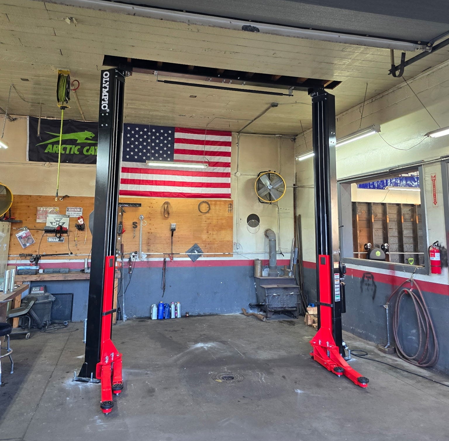 Model: Olympic 2PDDA-10 / 10,000 lb. / Asymmetric-Symmetric Post Design / Direct Drive / Single Point Lock / Long Reach Extension Arms / 3-Stage Foot / 153″ H X 145″ W / 10-Year Warranty / SHIPS FREE!