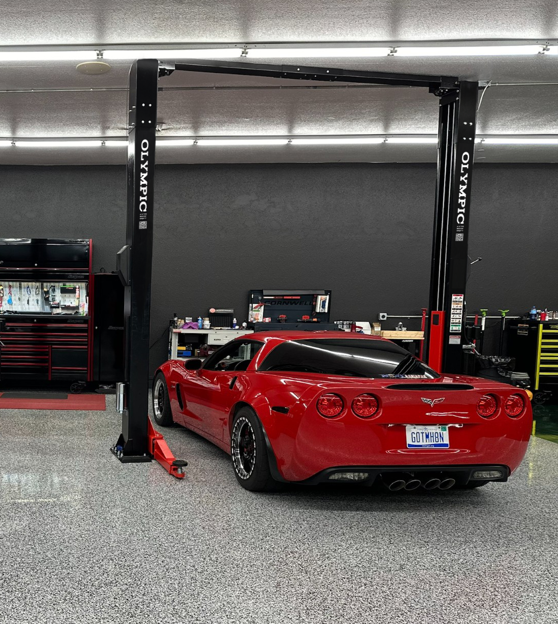 Model: Olympic 2PCFXL-10 / 10,000‐lb. / Symmetric Clear floor / Single Point Lock Release / 3-Stage Arms / 3-Stage Foot Pads / 153″ H X 135″ W 10-Year Warranty / SHIPS FREE!