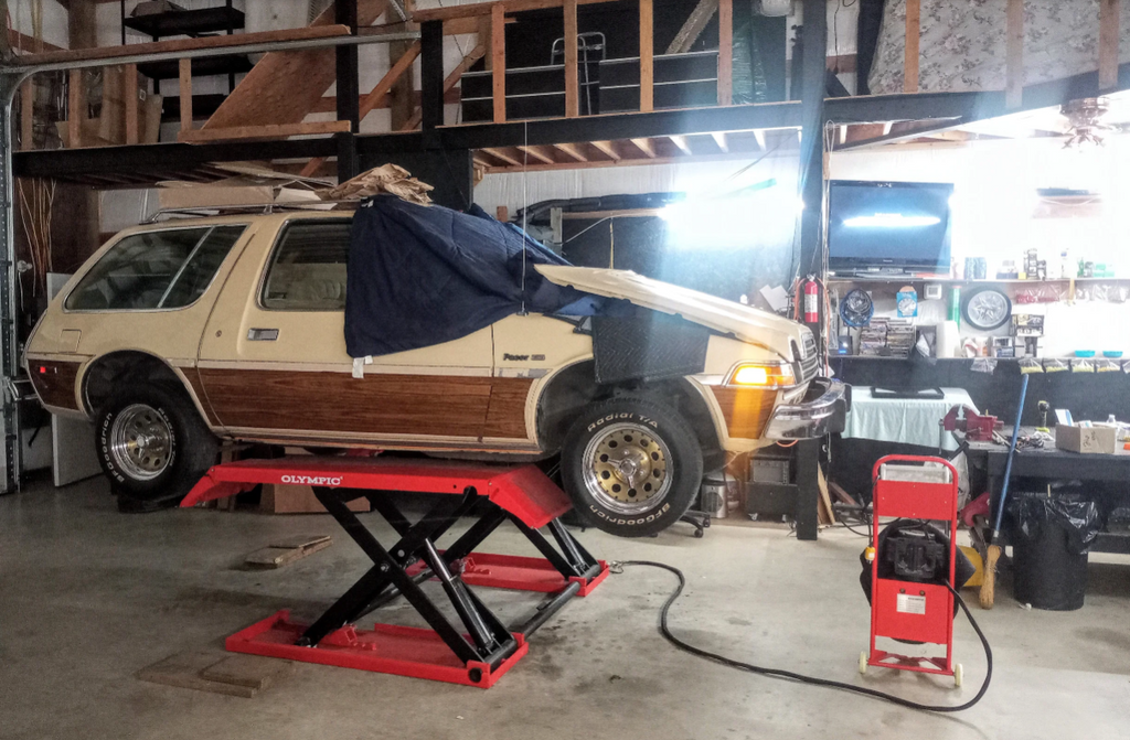 Olympic 4PML-9 9,000 lb Portable Car Storage & Maintenance Lift – 108″ W x 198″ L