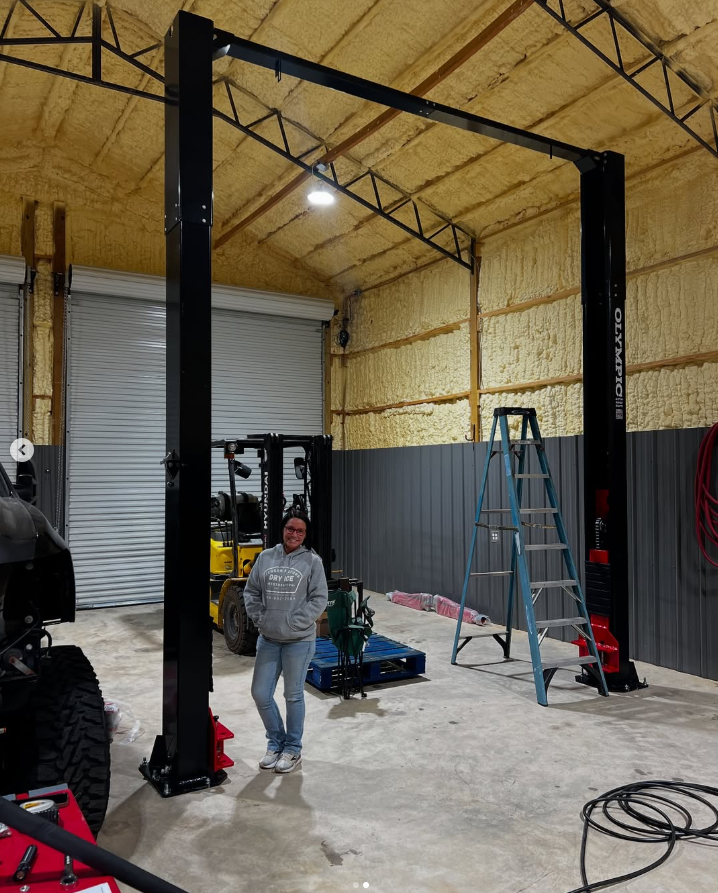 Model: Olympic 2PCFHD-15 / 15,000‐lb. HDXL / Symmetric Post / Clear floor / Single Point Lock Release / Long Reach Extension Arms / 10-Year Warranty / SHIPS FREE!