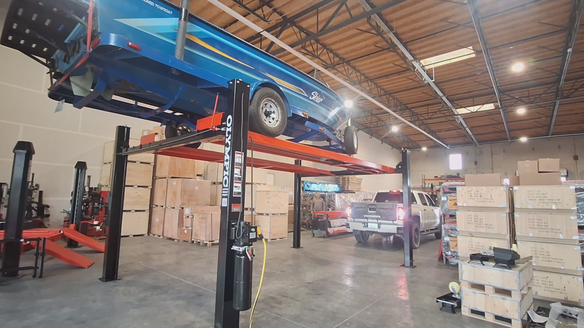 Model: Olympic HDMBL-10 "The Skipper" Portable Boat & Trailer Storage Lift / Extra Wide / Extra Long / Adjustable Width Runway / Sliding Hitch Wheel Rest / 84″ Storage Space / 125″ Between Posts / 195″ Platform Length / 10 Year Warranty / SHIPS FREE!