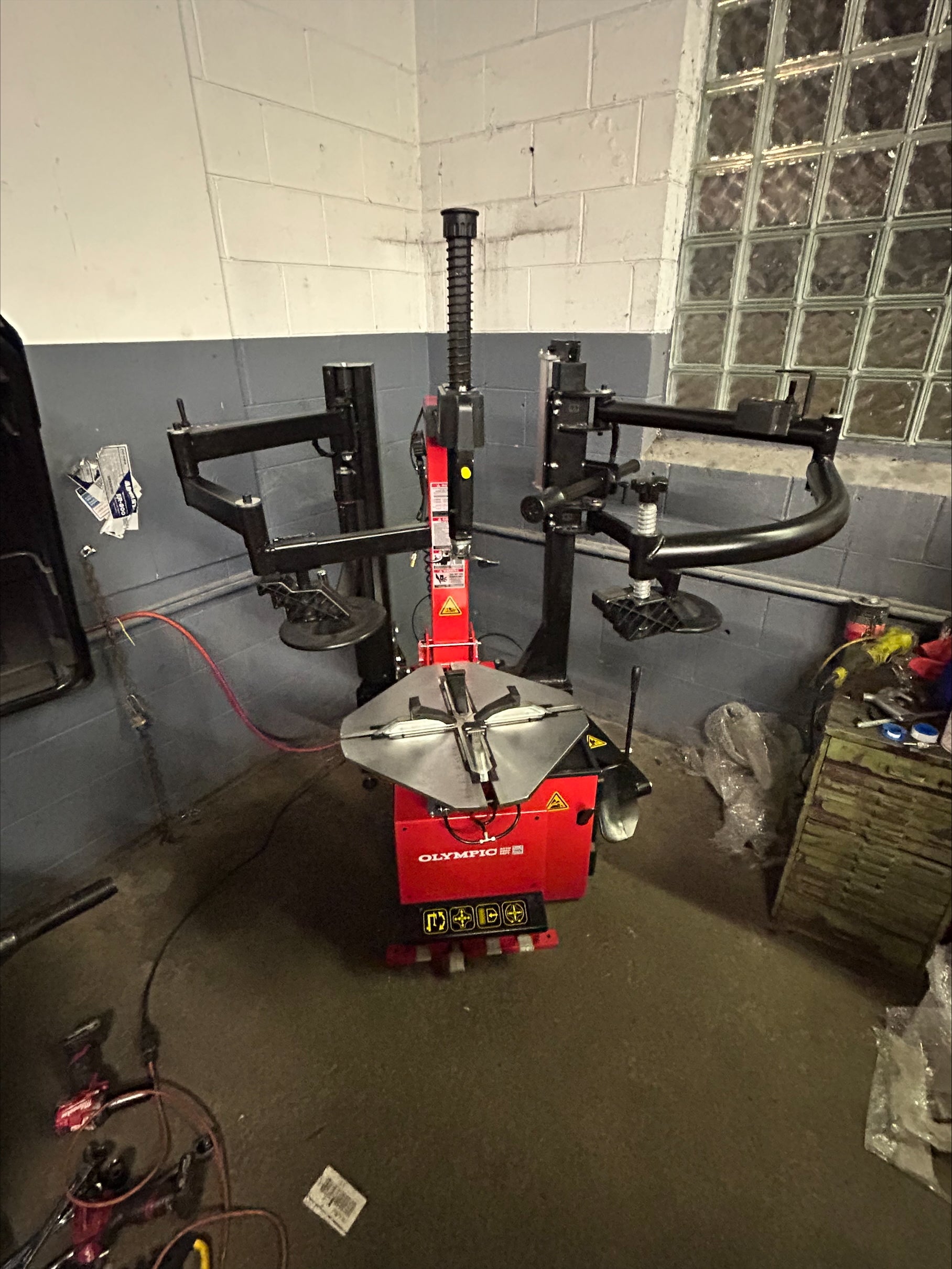 Model: T650 / The Olympic T650 Rim-Lock All-In-One Tire Changer / Pneumatically Operated Tilting Column / Double Assist Arms / Extra Large Capacity / 5-Year Warranty